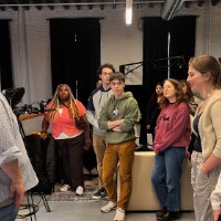 Students listening to Bryen Hensley during tour